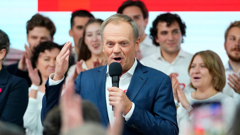 Donald Tusk addresses supporters at his party headquarters in Warsaw (Petr David Josek/AP)