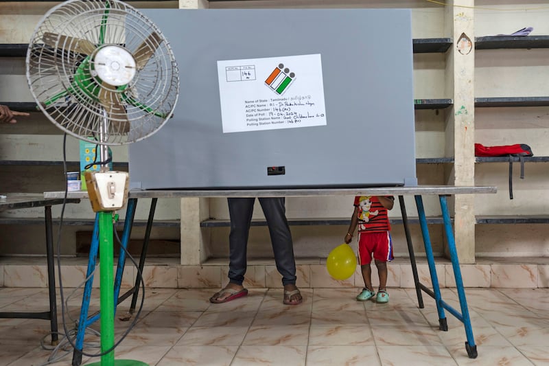 The first votes in the election were cast on Friday (Altaf Qadri/AP)