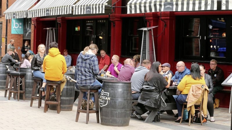 Revellers enjoying the last day of the Eat Out to Help Out scheme in Belfast. Picture by Mal McCann. 