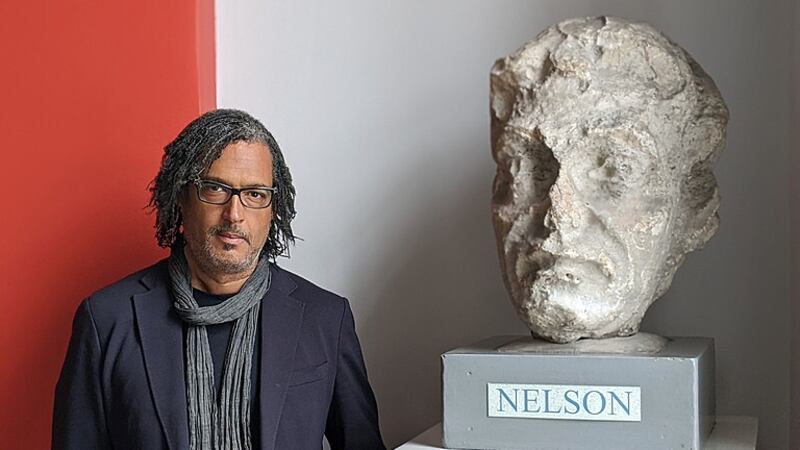 David Olusoga in Dublin's City Library next to the remains of Nelson's Pillar, blown up by the IRA in 1966