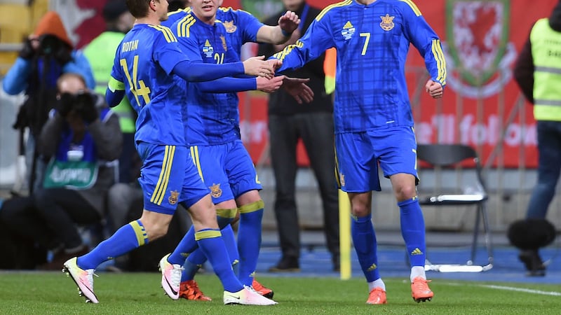 Ukraine's Andriy&nbsp;Yarmolenko&nbsp;(right) celebrates scoring the only goal in his side's Friendly against Wales