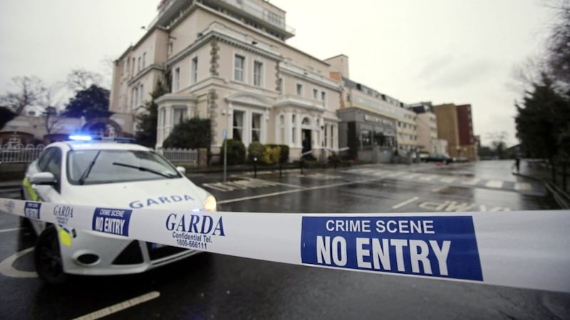 A Garda cordon outside the Regency Hotel in Dublin after a man was shot dead and two others injured as part of the Kinahan-Hutch gang feud 