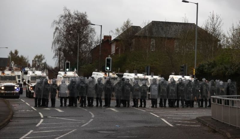 &nbsp;PSNI officers with riot shields line the Springfield road, during further unrest in Belfast. Picture date: Thursday April 8, 2021.