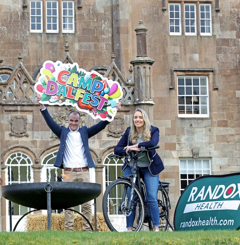 Lindsey Munnoch from Randox  and promoter Nigel Campbell at the launch of Camp Dalfest at Glenarm Castle   