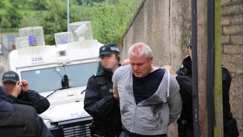Causeway Coast and Glens Independent councillor Padraig McShane is arrested in Ballycastle. Picture by Joe Gilmartin 