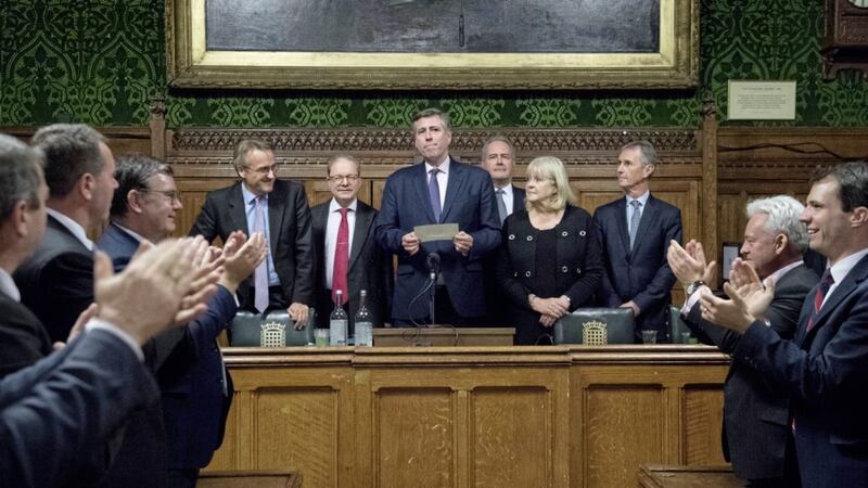 Sir Graham Brady (centre), chairman of the 1922 Committee, announces that Theresa May has survived an attempt by Tory MPs to oust her as party leader.              