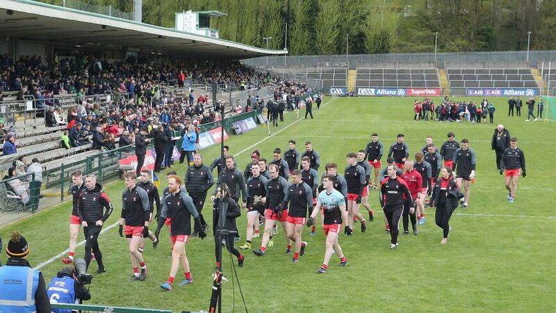 N Conor Glass (front row, right) and the Derry team head off the Brewster Park pitch following their warm-up ahead of Saturday evening’s Ulster SFC clash with Fermanagh Picture: Margaret McLaughlin