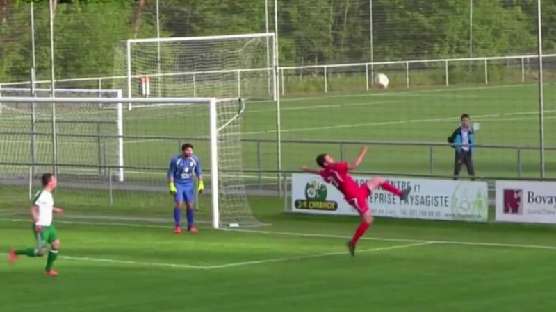 Andy Carroll and Emre Can have some competition for bicycle kick of the season…