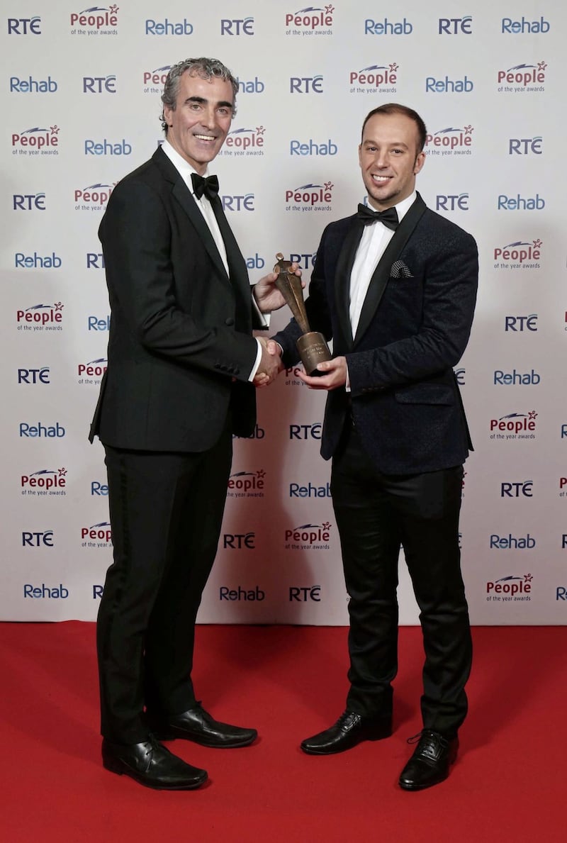 Davitt Walsh is congratulated by Jim McGuinness on his People of the Year award 