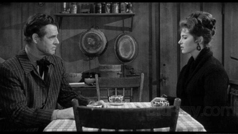 Robert Ryan and Tina Louise in Day Of The Outlaw 