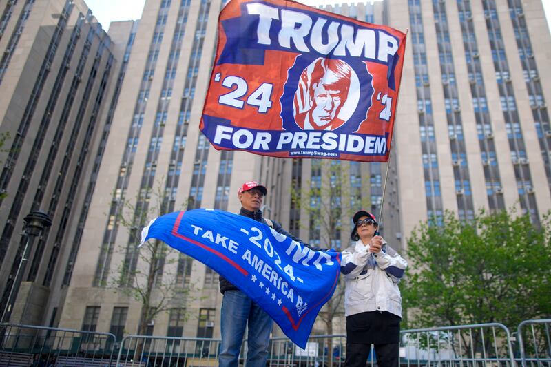 Supporters of former President Donald Trump stand outside Manhattan criminal court building (AP Photo/Mary Altaffer)