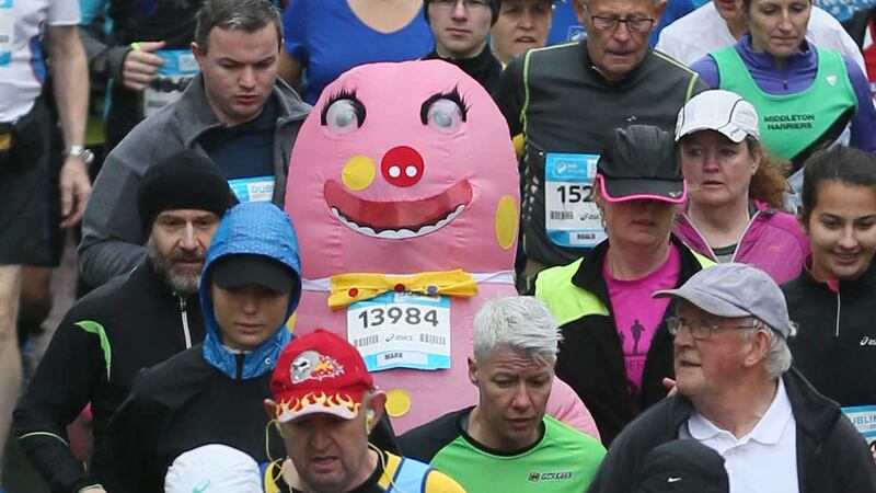 Mr Blobby sets off alongside thousands of other runners in the Dublin marathon. Picture by Niall Carson, PA Wire
