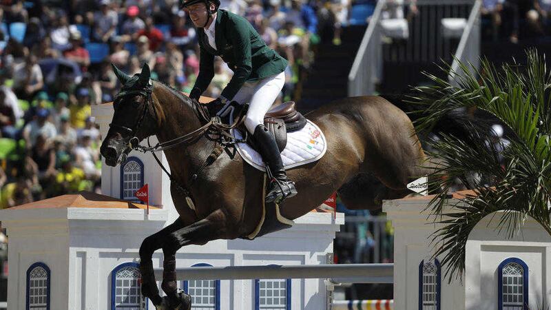 Ireland&#39;s Greg Patrick Broderick, riding Going Global, competes in the equestrian jumping competition at the 2016 Summer Olympics in Rio de Janeiro, Brazil, Sunday, Aug. 14, 2016. (AP Photo/John Locher). 