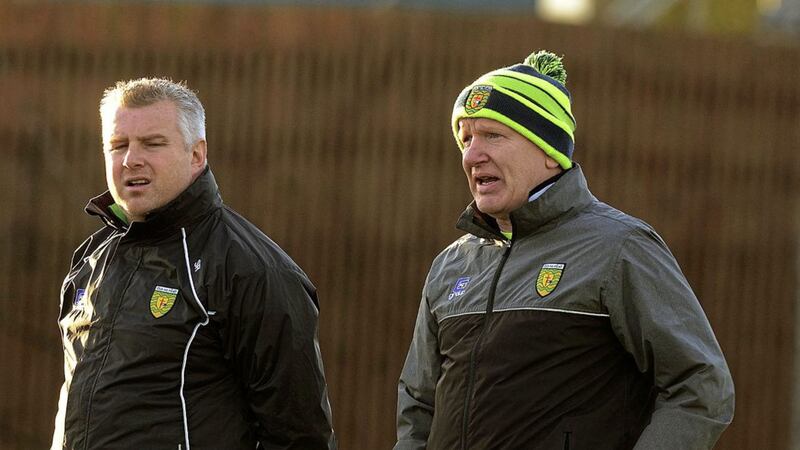 Donegal manager Declan Bonner (right) with Stephen Rochford, former Mayo manager, now with Donegal, having a look at the players warming down after the challenge game against Sligo in Colaiste Ailigh. Picture by Michael O&#39;Donnell 