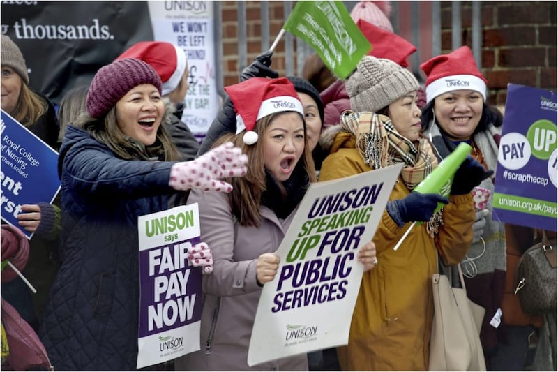 Nurses at Belfast's Royal Victoria Hospital on strike for fair pay last year. Picture by Hugh Russell
