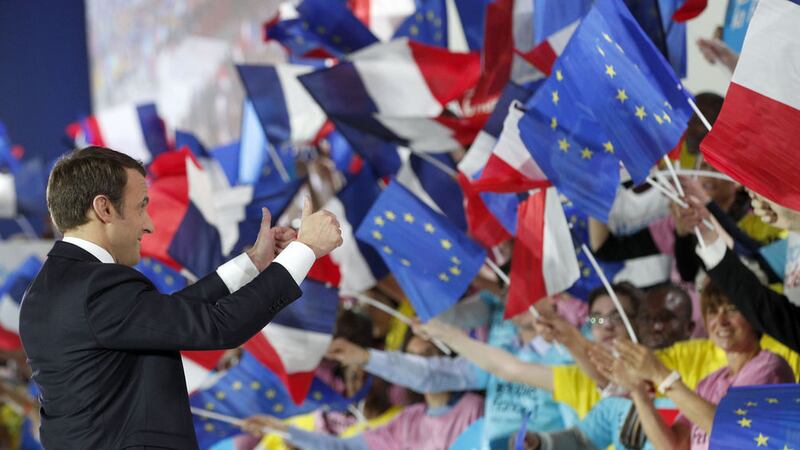 French Independent centrist presidential candidate Emmanuel Macron gives a thumbs-up to the audience at a campaign rally in Paris yesterday<br />PICTURE: Christophe Ena/AP