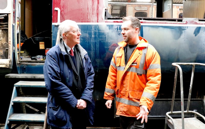 Downpatrick Railway chairman Robert Gardiner (right) met with Northern Ireland Office Minister Lord Caine last month to survey the flooding damage.