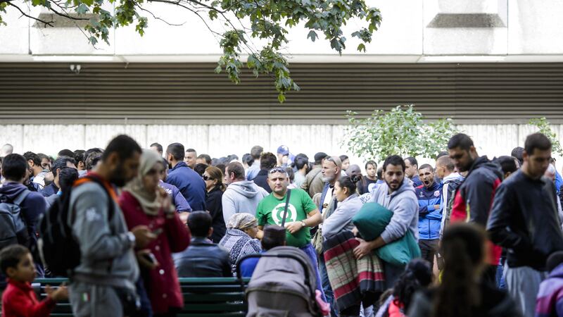 Refugees gather in front of a reception centre in Berlin&nbsp;