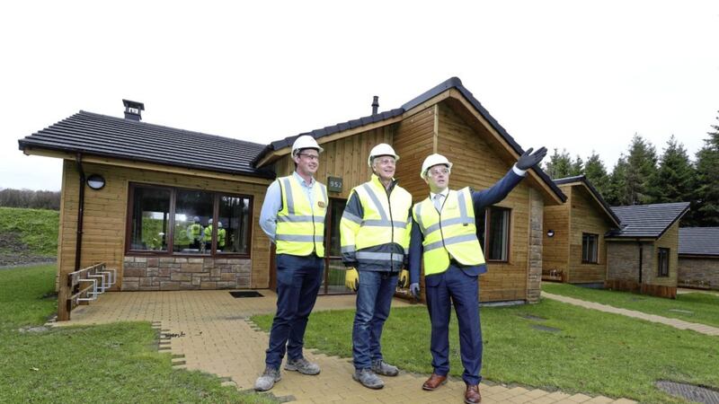 Rapid-build home manufacturer FastHouse has completed a contract to provide and erect the timber frames for 466 lodges at the highly anticipated Center Parcs in Longford. Pictured are Sisk senior contracts manager Cormac Fitzpatrick, Center Parcs construction and development director Paul Kent and FastHouse sales and installations director Sean Fox 