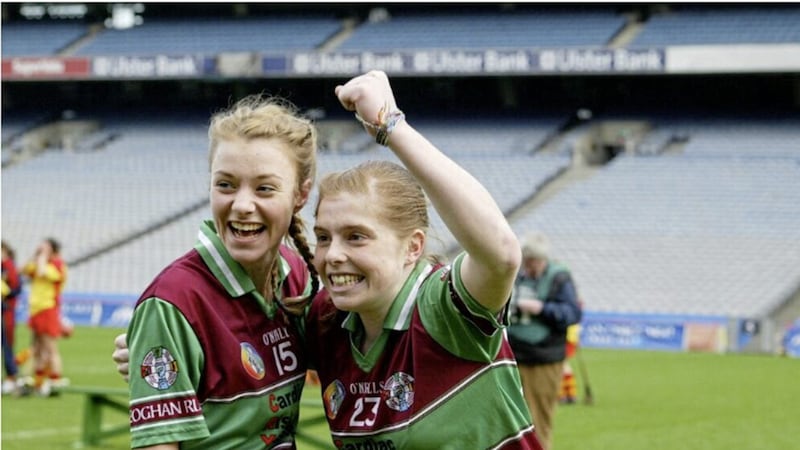 Katie Mullan (No 23) with Rosanna McAleese (No 15) after they had helped Eoghan Rua, Coleraine win the All-Ireland Intermediate Camogie title at Croke Park in 2011. 