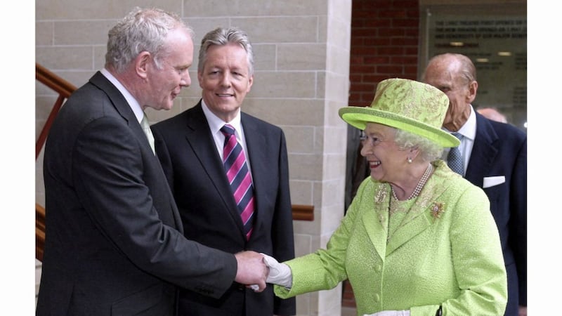 Queen Elizabeth II shakes hands with Martin McGuinness in 2012