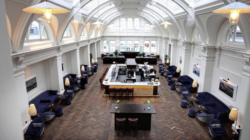 Titanic Hotel Belfast&#39;s bar is located in one of the former drawing offices of the restored Harland and Wolff headquarters Picture: Ann McManus 