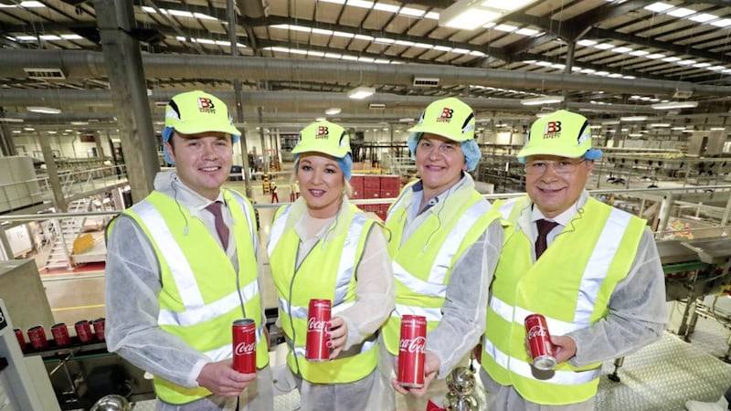 AGENDA: The Deputy First Minister Michelle O&rsquo;Neill and First Minister Arlene Foster and with general manager of Coca Cola HBC Ireland and Northern Ireland Miles Karemacher and group supply chain director of Coca Cola HBC Marcel Martin  
