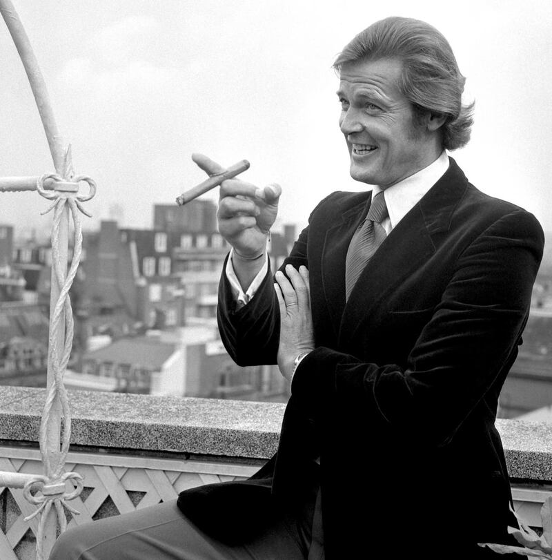 Roger Moore pictured on the day in August 1972 when he was announced as the new James Bond (PA)