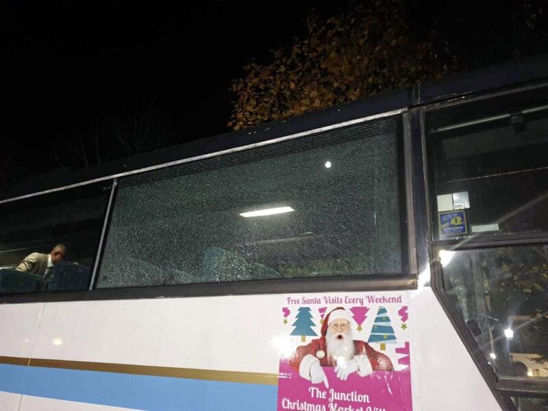 Damaged caused to the bus a group of tourists were travelling in when it was attacked in north Belfast on Saturday 