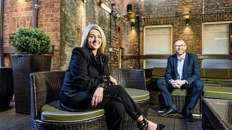 Belfast Chamber chief executive Simon Hamilton and VenYou client services director Donna Linehan pictured on the terrace area of the Scottish Provident Building. Picture: Elaine Hill 