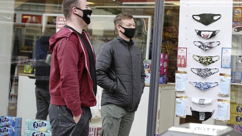 It is now compulsory to wear a mask in shops and other enclosed public spaces in Northern Ireland. Picture by Hugh Russell 