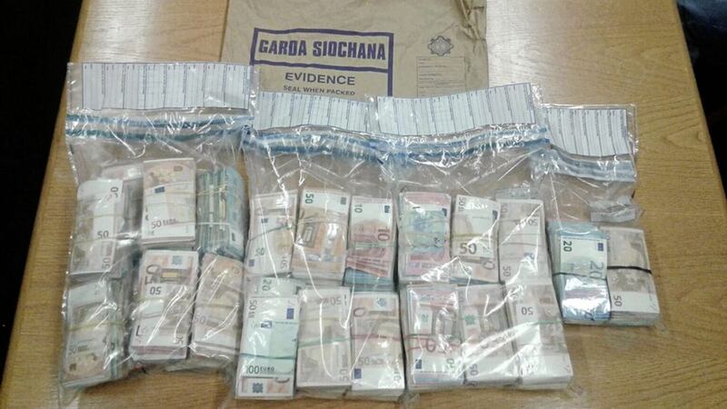 Garda handout photo of 300,000 euro in bank notes which detectives investigating the Kinahan crime cartel seized, as they have arrested two men. A man in his 30s was detained as he tried to enter an apartment in Sandyford, south Dublin, carrying the money. Picture by Garda/PA Wire 