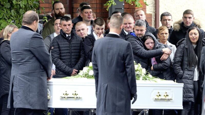 The funeral of Warren Crossan makes its way to St Johns Church in west Belfast 