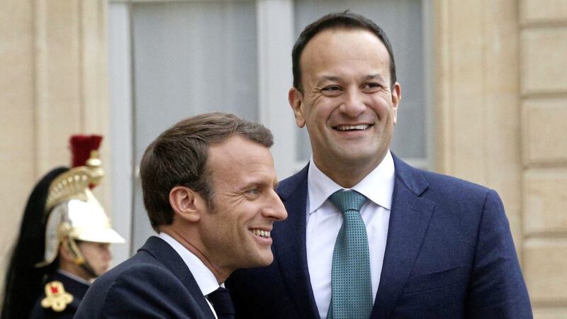 French President Emmanuel Macron, left, greets Taoiseach Leo Varadkar before a meeting at the Elysee Palace in Paris yesterday. Picture by AP Photo/Christophe Ena 