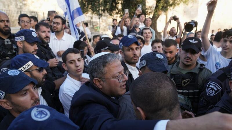 Israel’s National Security Minister Itamar Ben-Gvir, centre, attends a march marking Jerusalem Day (Mahmoud Illean/AP/PA)