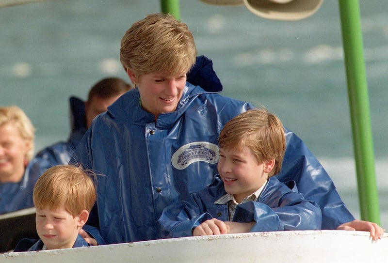 Diana, Princess of Wales, with her sons, Harry and William, aboard the Maid of the Mist cruiser near to Niagara Falls
