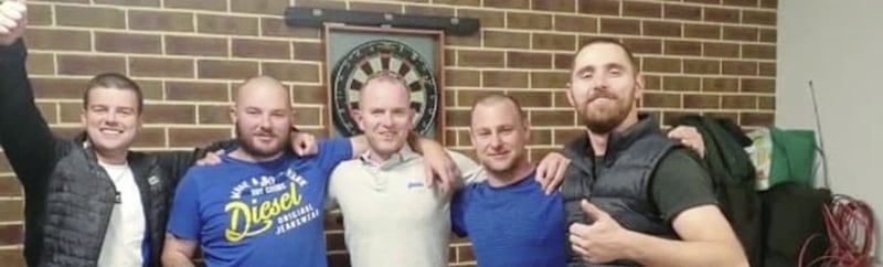 Stephen Cunningham&#39;s brother, Gary, pictured right, with friends in Australia who shaved their heads 