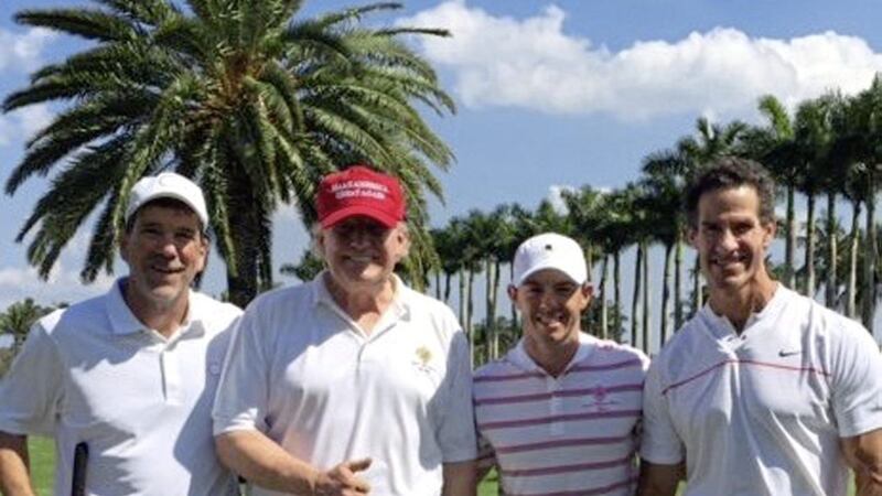 Rory McIlroy, third left, with US president Donald Trump, second left, in Florida where they played a round of golf. Picture by Clear Sports/Twitter