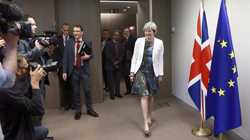 British Prime Minister Theresa May, right, arrives for a meeting with European Council President Donald Tusk during an EU summit in Brussels&nbsp;