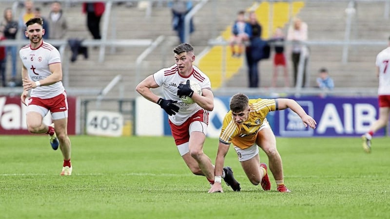 Tyrone&#39;s Richie Donnelly gets away from Antrim&#39;s James McAuley during last weekend&#39;s one-sided Ulster SFC quarter-final. While Antrim battled bravely, they were always going to be outgunned by the might of their opponents Picture by Seamus Loughran 