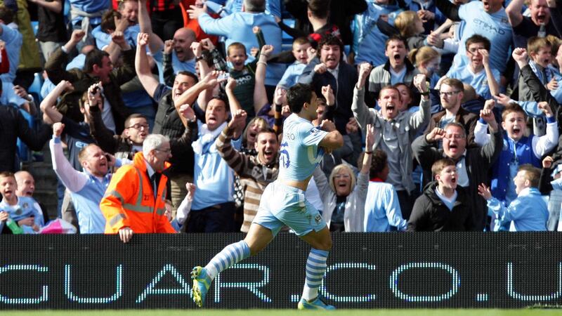 Manchester City's Sergio Aguero celebrates after scoring the third goal during the Barclay's Premier League match against Queen's Park Rangers at the Etihad Stadium, Manchester on Sunday May 13 2012.<br />City won the game 3-2 to lift the Premier League title for the first time in 44 years