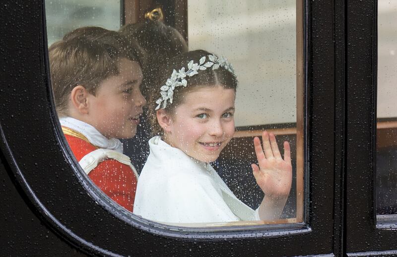 Princess Charlotte and Prince George returning to Buckingham Palace after the King’s coronation. Joe Giddens/PA