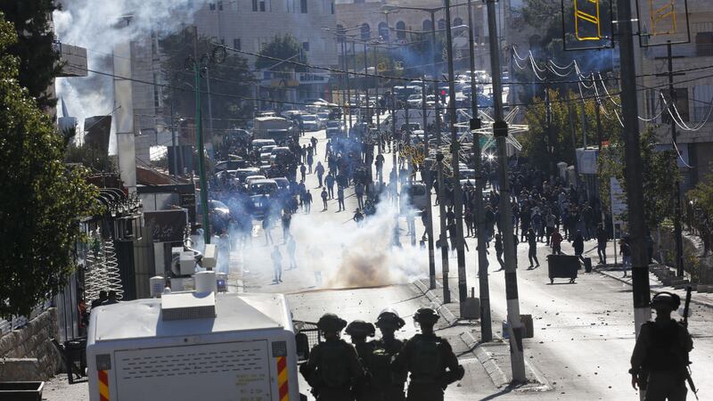 Palestinians clash with Israeli troops during a protest against US president Donald Trump's decision to recognise Jerusalem as the capital of Israel in the West Bank city of Bethlehem, Friday, Dec.8, 2017. Picture by Nasser Shiyoukhi, Associated Press&nbsp;