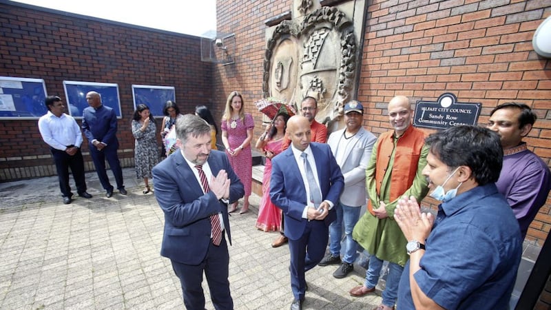 Sanjay Ghosh, founder of ImageNation and health minister Robin Swann at the Sandy Row Community Centre in south Belfast on Tuesday. Picture by Mal McCann 