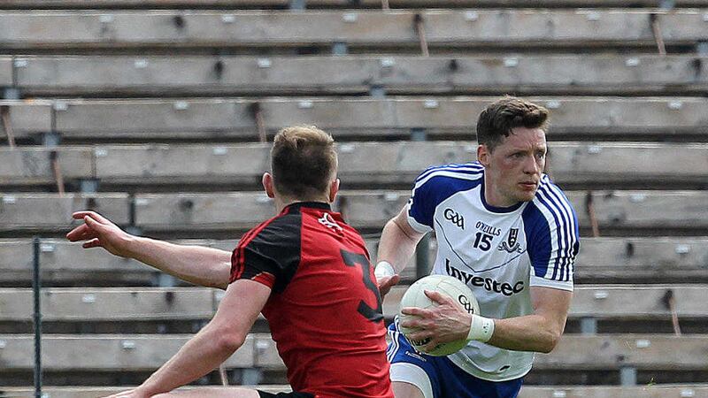 Monaghan captain Conor McManus takes on Down full-back Gerard McGovern during last Sunday's Ulster SFC clash at Clones <br />Picture by Philip Walsh