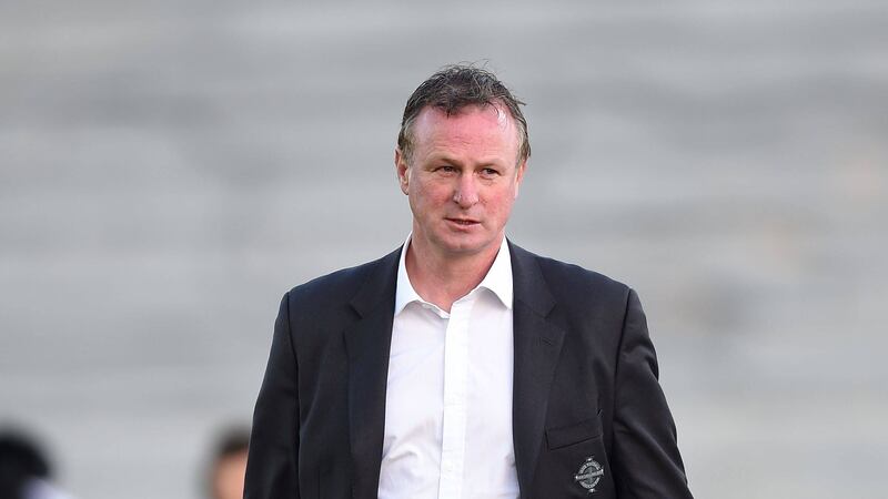 Michael O'Neill believes the North's hopes of qualification for next year's European Championship rest on their next two games<br />Picture: PA