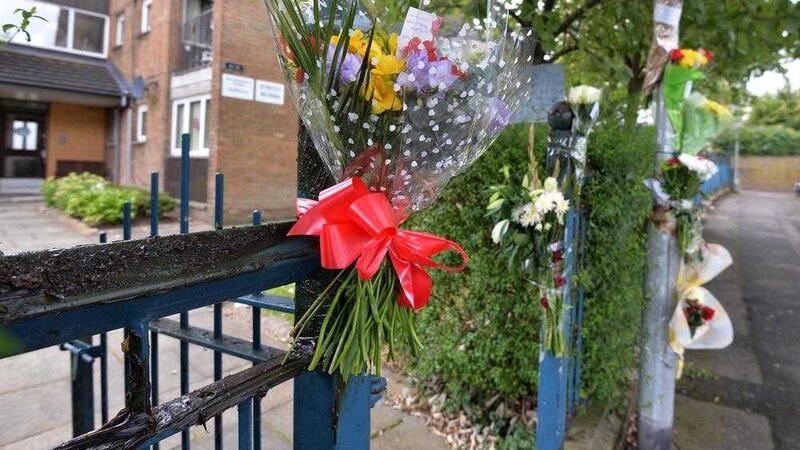 Flowers have been left at Sunningdale Gardens off the Ballysillan Road where John Boreland was shot dead 