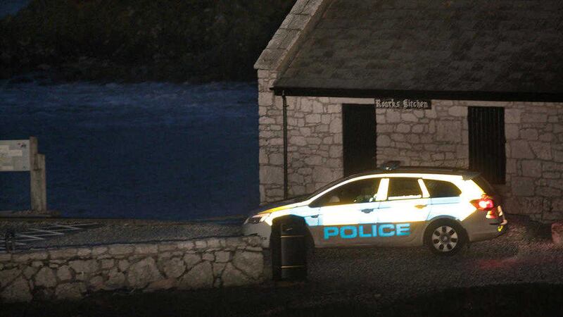 Police at Ballintoy Harbour on Wednesday night during the search for George Jamieson.  Picture by Margaret McLaughlin 