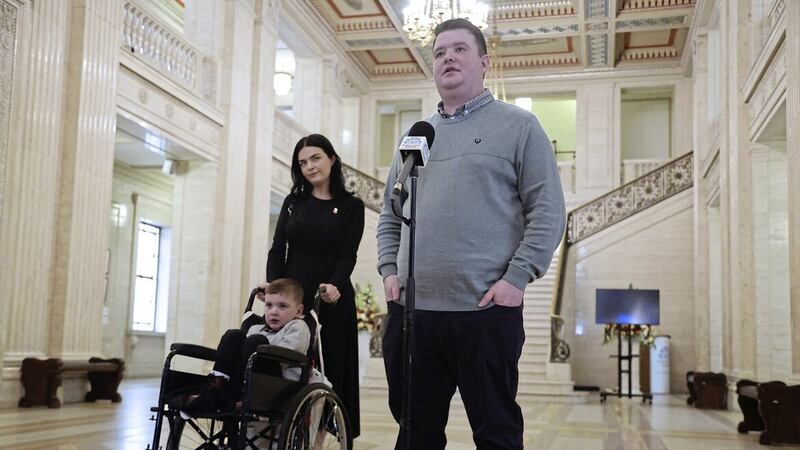 Da&iacute;th&iacute; Mac Gabhann and his parents, pictured at Stormont last week, have led the campaign on organ and tissue donation. DUP intransigence means new legislation can&#39;t be passed by the Assembly. Picture by Hugh Russell 