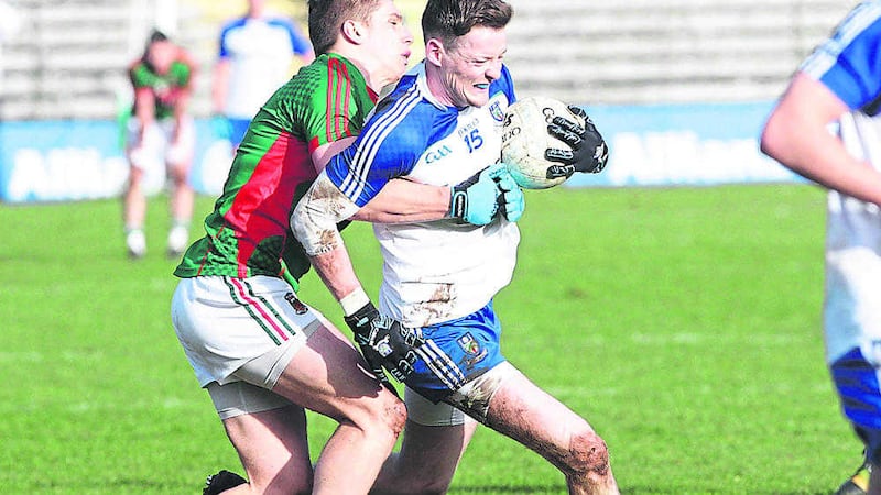 Monaghan's Conor McManus attempts to get away from Mayo's Lee Keegan during Sunday's game at Clones <br />Picture by Colm O'Reilly